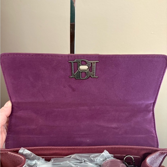 Badgley Mischka Plum and gun metal
Studded Handbag - NWT - Picture 7 of 12